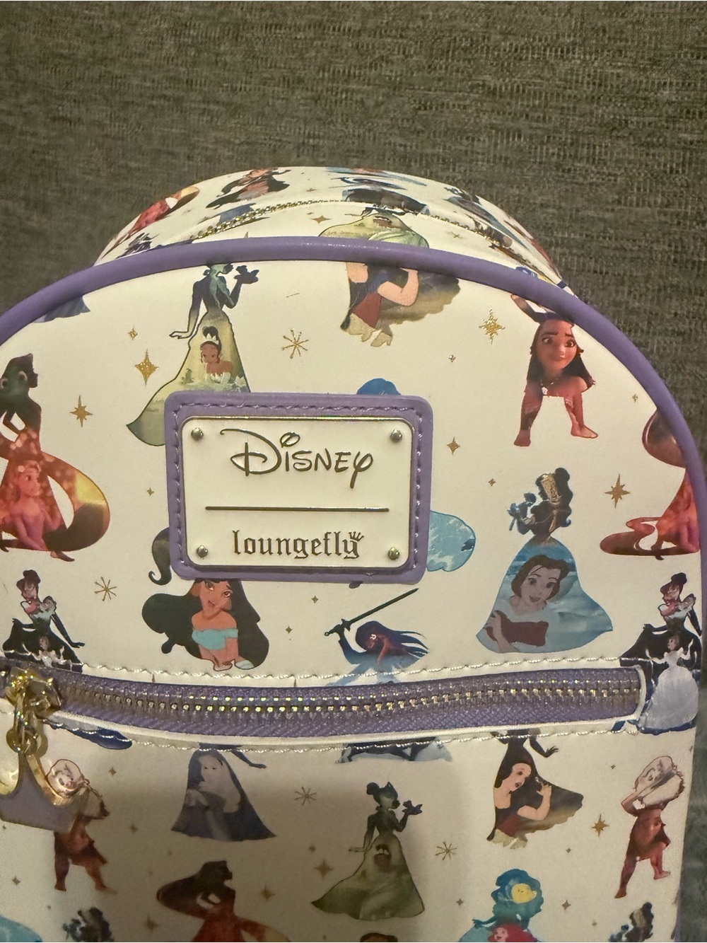 Loungefly White Mini Backpack with Purple Trim and Multicolor Princess Art